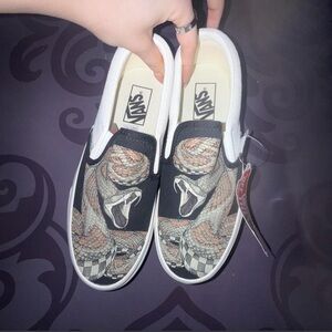 Vans Women’s Black Snake Graphic Slip-On Sneakers